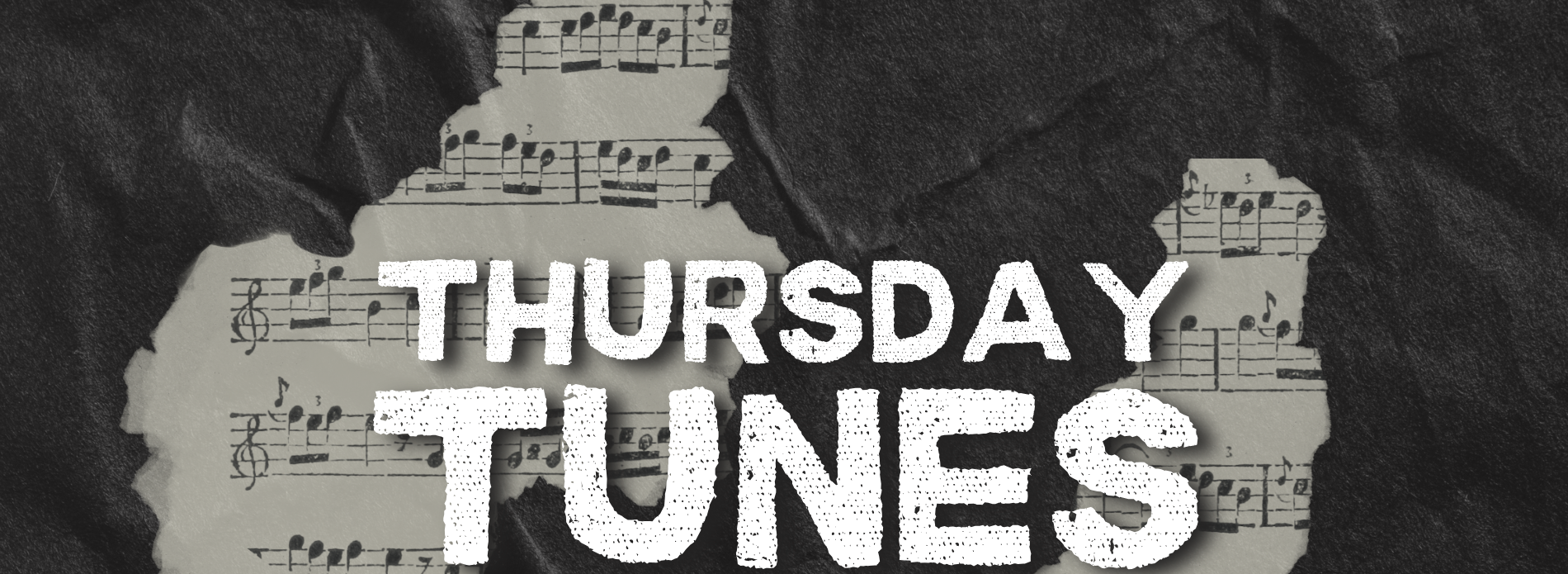 sheet music covered with ripped black paper text reading thursday tunes