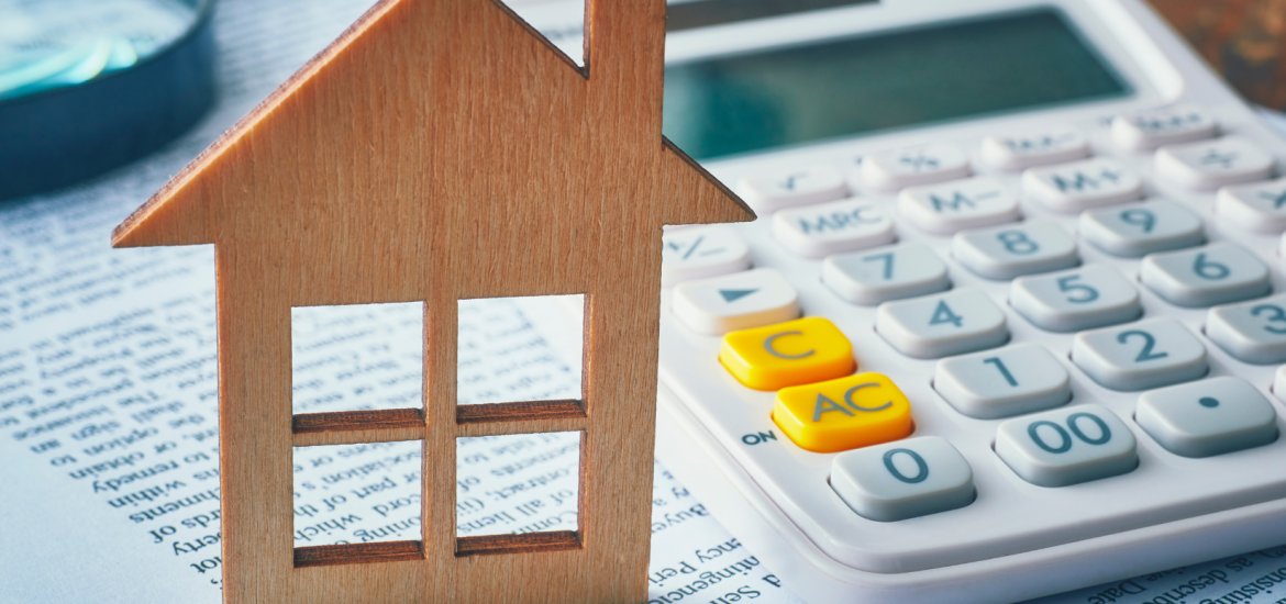 Wooden House and Calculator
